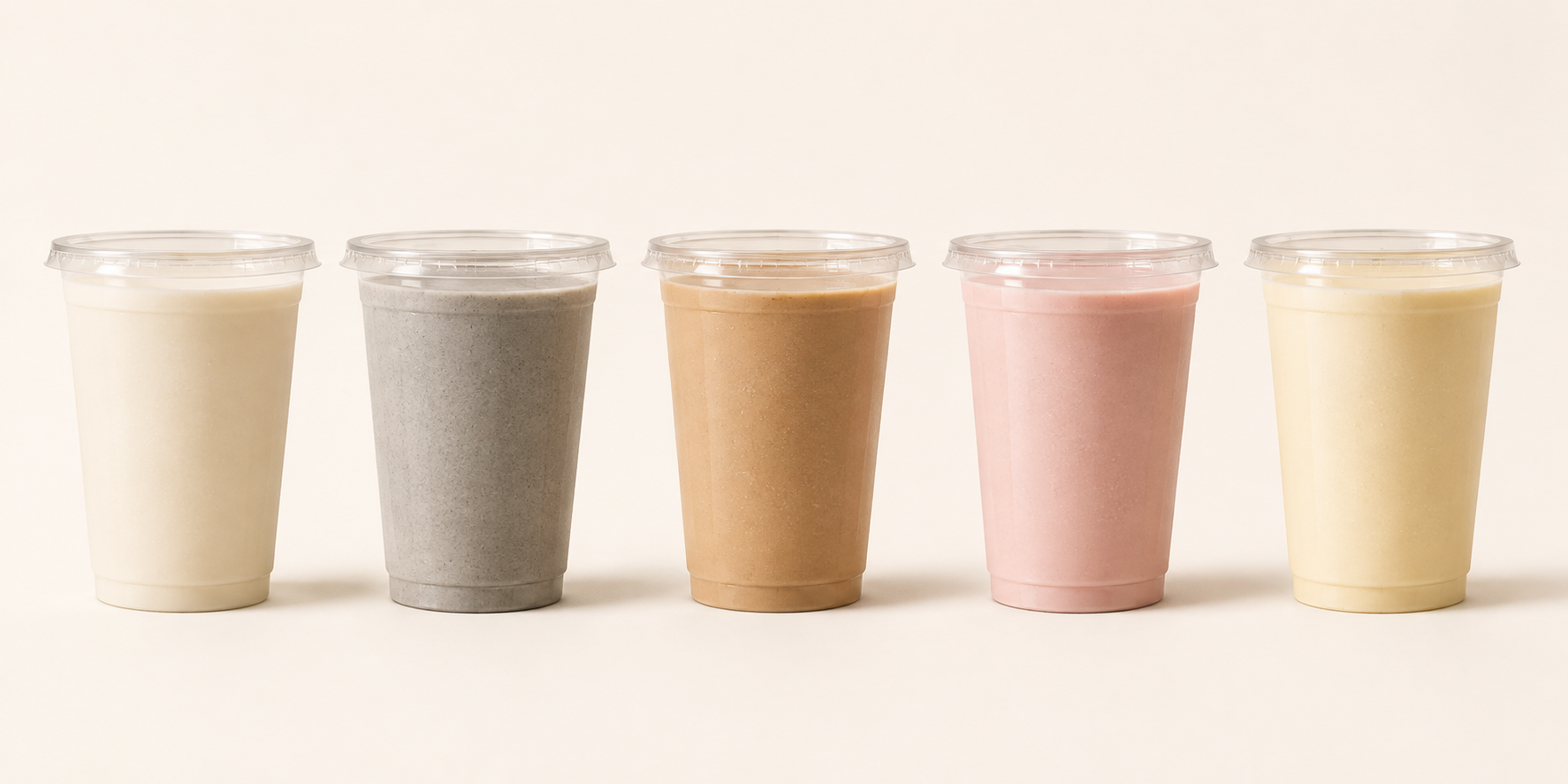 Five chilled Soyla drink studies without ice: original, black sesame, coffee, strawberry and banana